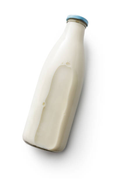 drinks: bottle of milk isolated on white background - milk bottle fotos imagens e fotografias de stock