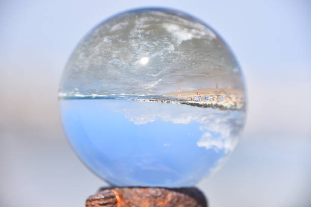 istock Crystal ball in the sea 991006896