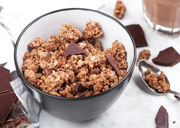 Bowl with organic chocolate granola breakfast