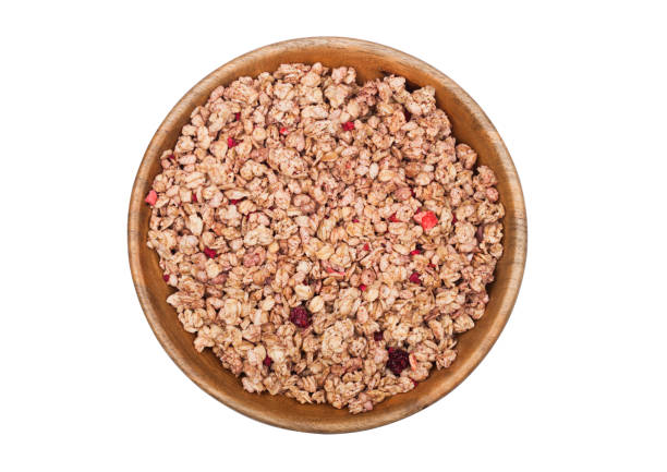 istock Bamboo wood bowl with organic granola cereal 991012708