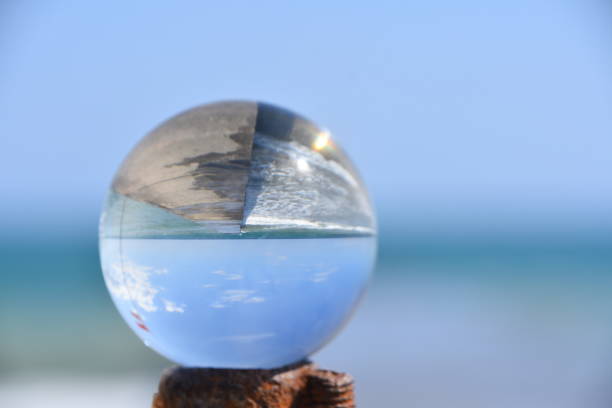 istock Crystal ball in the sea 991014740