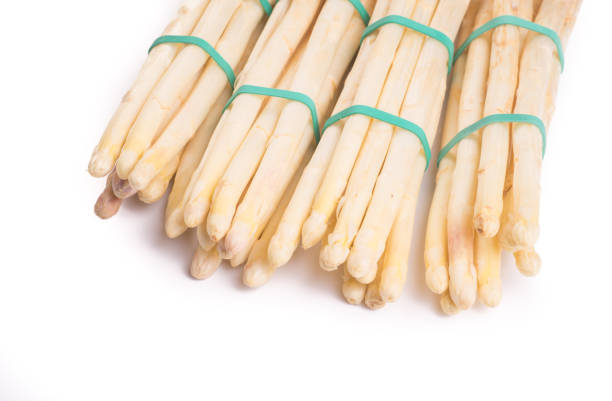 istock bundle of organic asparagus held together with green elastics rubber bands 991014896