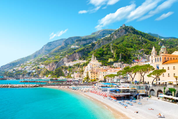 Morning view of Amalfi cityscape, Italy Morning view of Amalfi cityscape on coast line of mediterranean sea, Italy puglia beach stock pictures, royalty-free photos & images