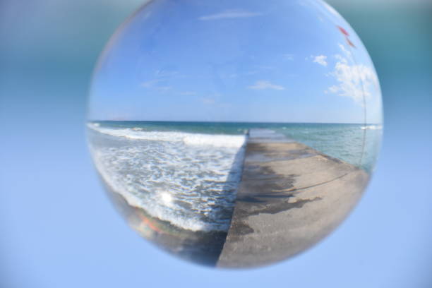 istock Crystal ball in the sea 991024614