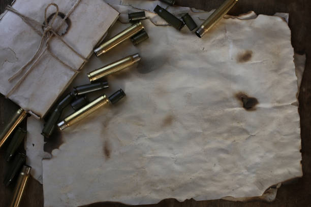 istock bullet and retro paper on the table 991029466