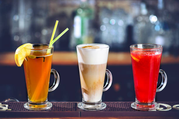 istock Three different alcoholic cocktails at bar counter 991031752