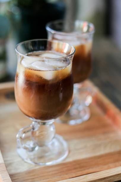 istock Iced coffee's on wooden tray 991036460