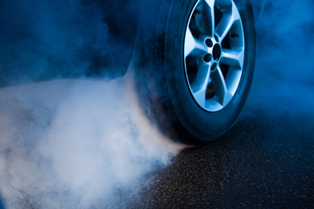 istock Smoke coming out from car exhaust 991040138