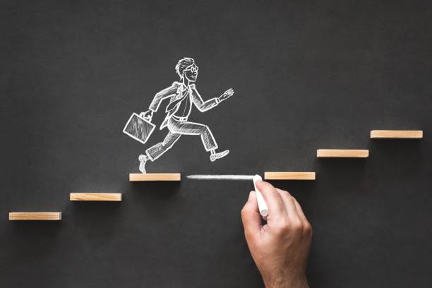 istock Career Planning and Business Challenge Concept with Hand Drawn Chalk Illustrations on Blackboard 991046286