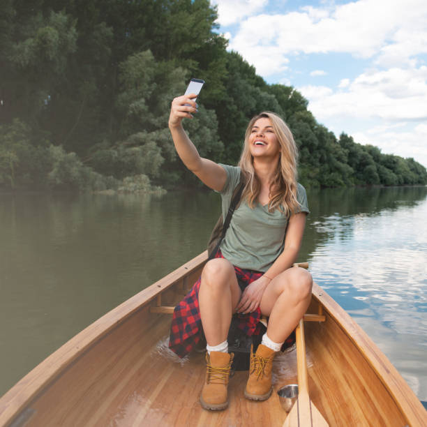istock Woman in canoe 991046874