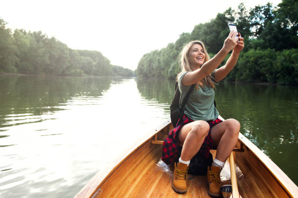 istock Woman in canoe 991047248