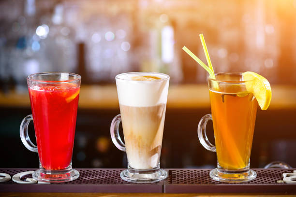 istock Three different alcoholic cocktails at bar counter 991047862