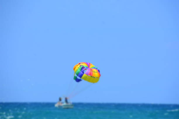 istock A colorful parachute in the sea 991050668
