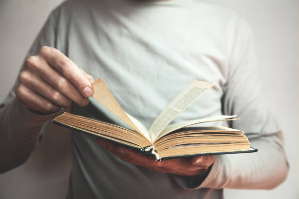 istock Caucasian man reading bible. 991072688