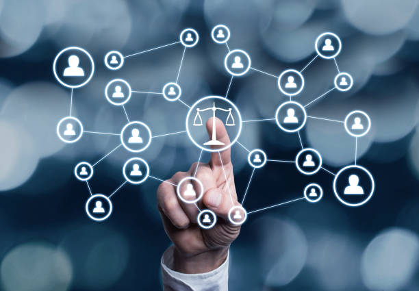 Hand pressing scales justice and social network people. Business justice on Internet