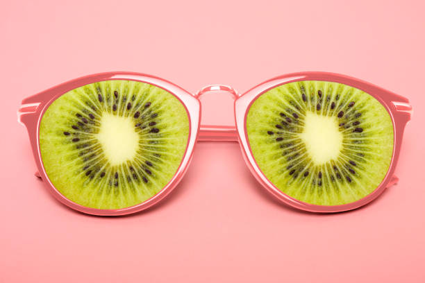 istock Bright pink sunglasses with kiwi 991077520