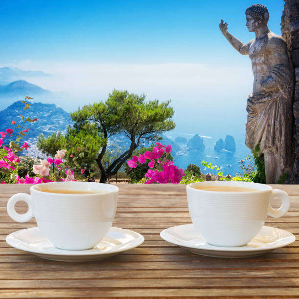 cup of coffee at Capri, Italy coffee for two with view of mount of Capri, Italy table ledge stock pictures, royalty-free photos & images