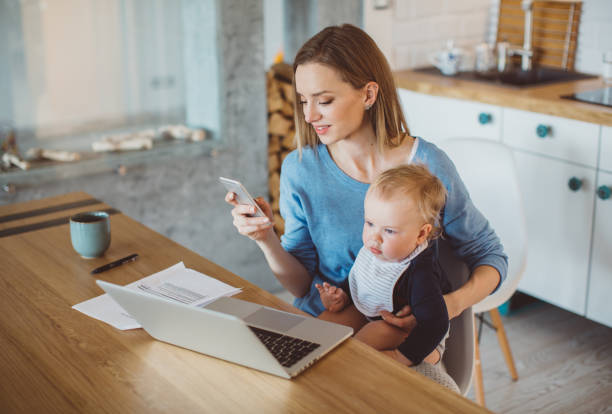 istock Busy mother spend morning with son 991082768