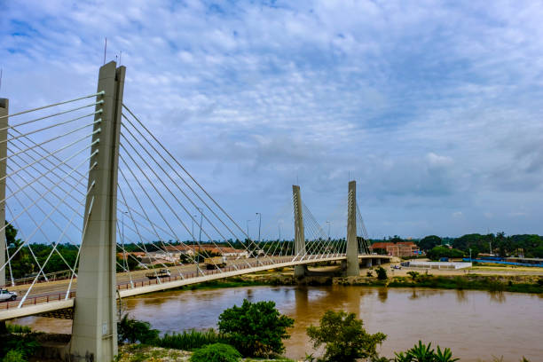 Catumbela Bridge Lobito Modern suspension Bridge, 4 April, over Catumbela River links cities of Benguela and Lobito in Angola bridge crossing cloud built structure stock pictures, royalty-free photos & images