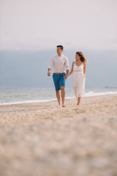 istock Out for a leisurely stroll on the beach 991084610