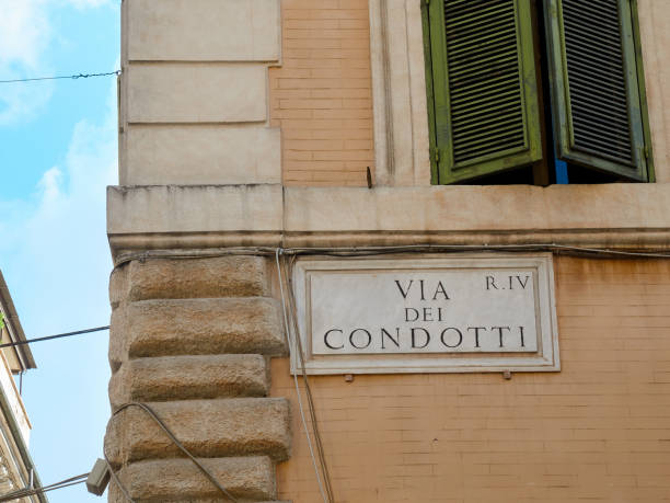 istock Via dei Condotti marble sign Rome Italy 991089984