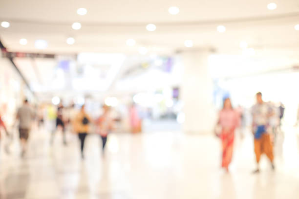 istock Blurred background, Blur store with people and bokeh light, business background 991094550