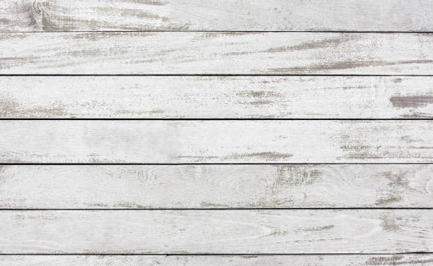 istock Old peel off wood plank white paint surface texture background,natural pattern backdrop,material for design. 991099674