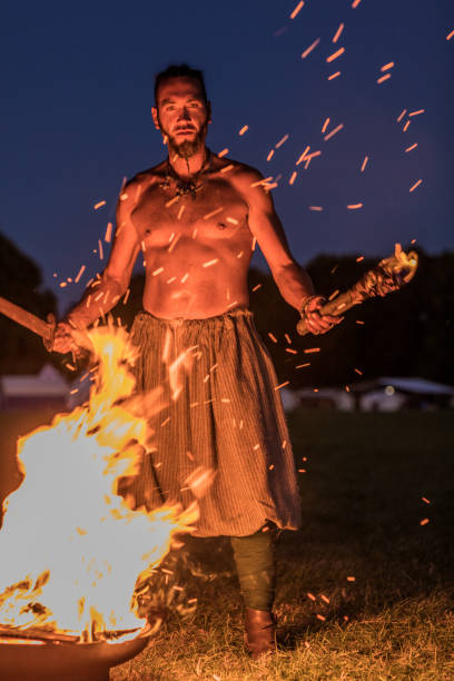 istock A viking warrior holding a fiery torch 991108302