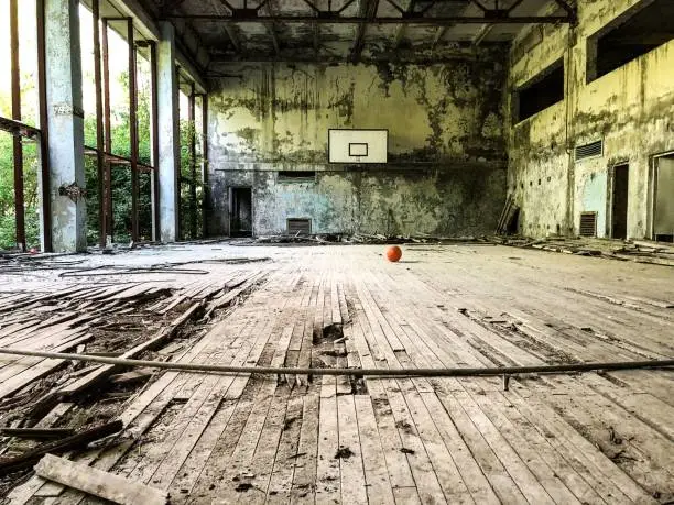 Basketball in an abandoned school building.