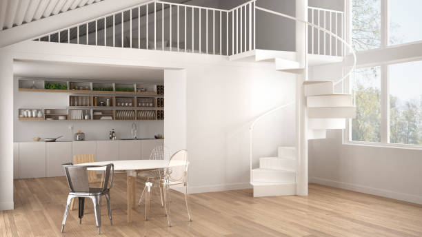 minimalistyczna biała kuchnia z antresolą i nowoczesnymi spiralnymi schodami, poddasze z sypialnią, tło wystroju wnętrz, pomysł projektanta architekta - loft apartment window indoors domestic room zdjęcia i obrazy z banku zdjęć