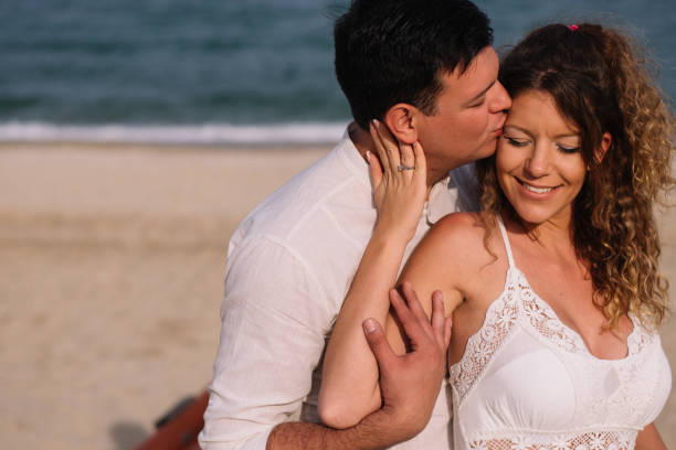 istock Couple at sea side 991114618