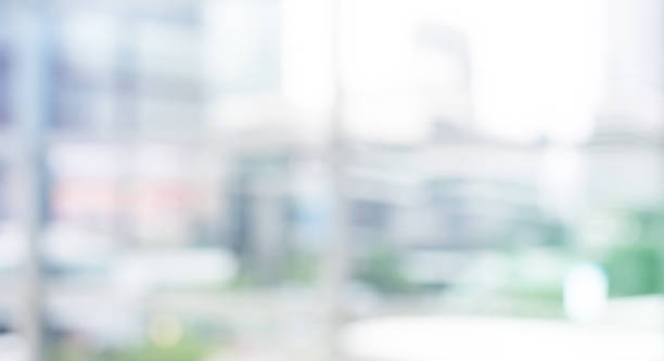 istock Blurred abstract wall building with big window glass background.material decoration design 991136566