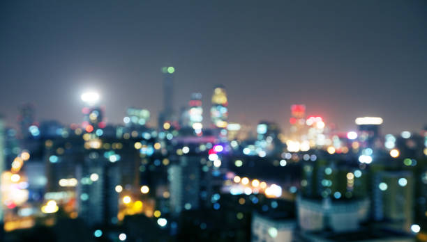 istock Night blurred bokeh light city office buildings in Beijing China 991137036