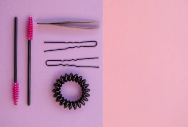 istock Set of cosmetics on pink and violet background. 991149960