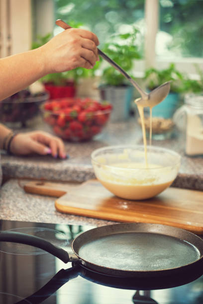 istock Woman Preparing Pancakes 991161684