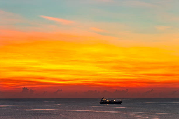 istock Sunrise over the Atlantic Ocean with ship in background 991165976