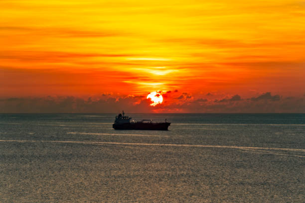 istock Sunrise over the Atlantic Ocean with ship in background 991166076