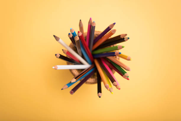 istock Top view Crayon Pencil on Yellow Background. Copy Space. 991172986