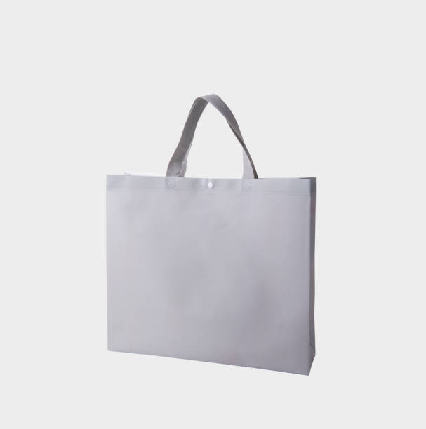 istock bag canvas fabric for mockup blank template isolated on white background. 991173148
