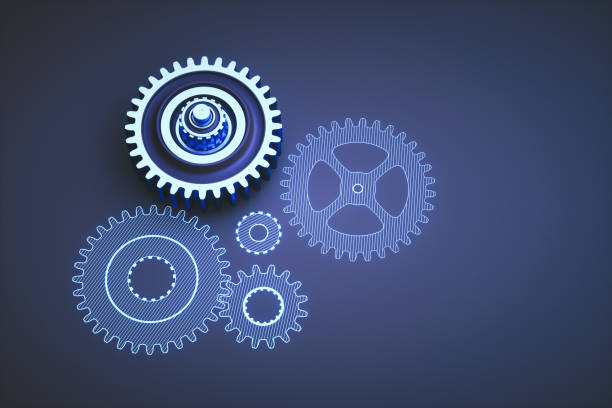 istock Single metallic gear with drawing blueprint on a dark blue surface 991181240
