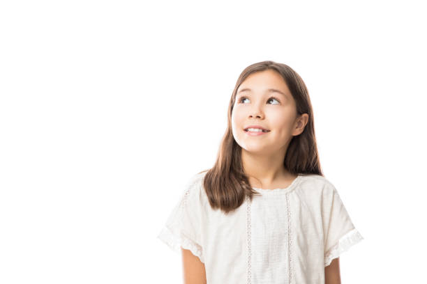 istock Pretty kid looking away isolated on white 991204920