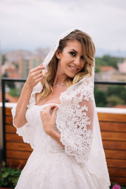 istock Beautiful bride in wedding dress 991214626