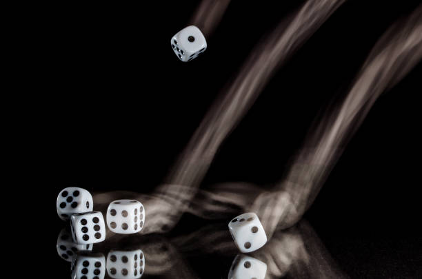 istock Risking All on a Roll of the Dice 991215066