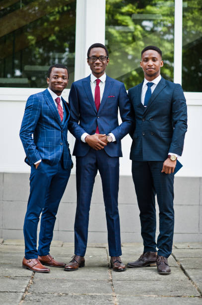 istock Three african american happy successful mans at suit. 991219426