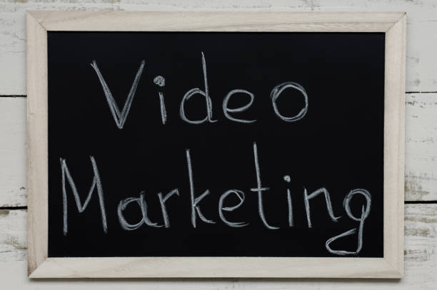 istock Video Marketing concept. Handwritten text at blackboard, top view 991245252