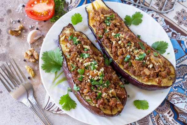 baked eggplants with meat, walnut and vegetables. traditional middle eastern or arab dish. - 11992 imagens e fotografias de stock