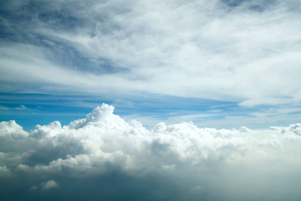 istock blue sky with clouds closeup. blue sky background 991289918