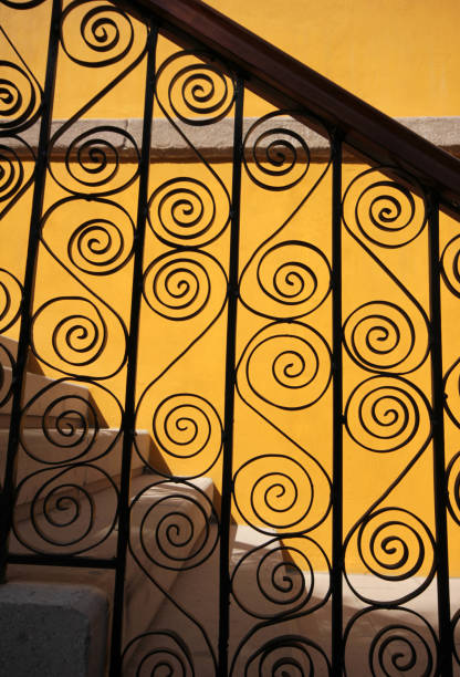 istock Forged Metal Fence on a Staircase 991336740