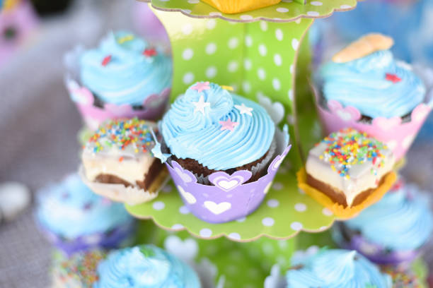 Candy bar with a lot of different candies and sweet cakes