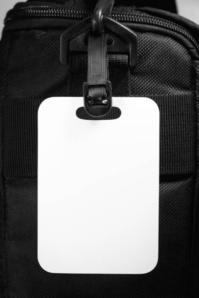 istock Empty luggage tag with travel bag. Blank card for design. 991343082